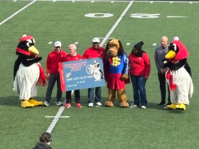 Presentation of Affinity Card on the field