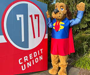 Dollar Dog waving by 7 17 sign